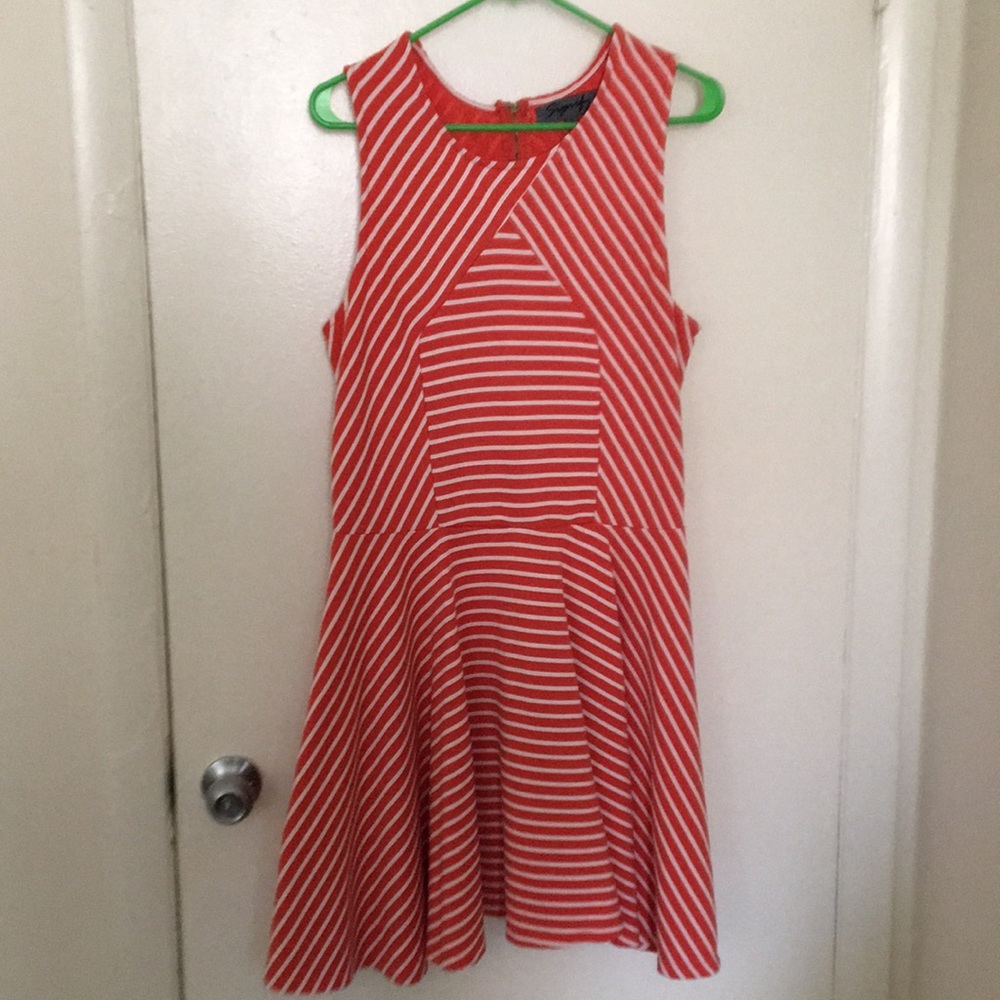 Sleeveless orange and white striped dress